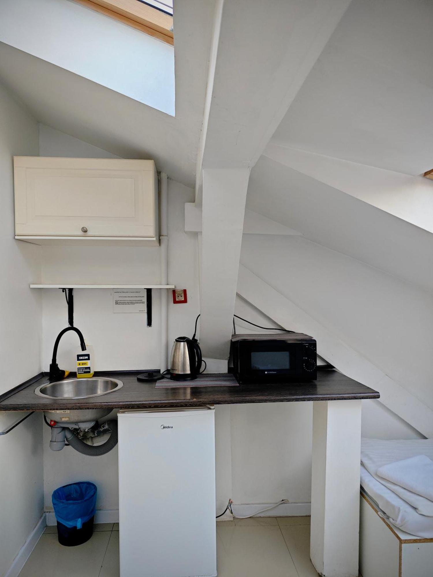 Apartamenty Hoza Attic Studio วอร์ซอ ห้อง รูปภาพ