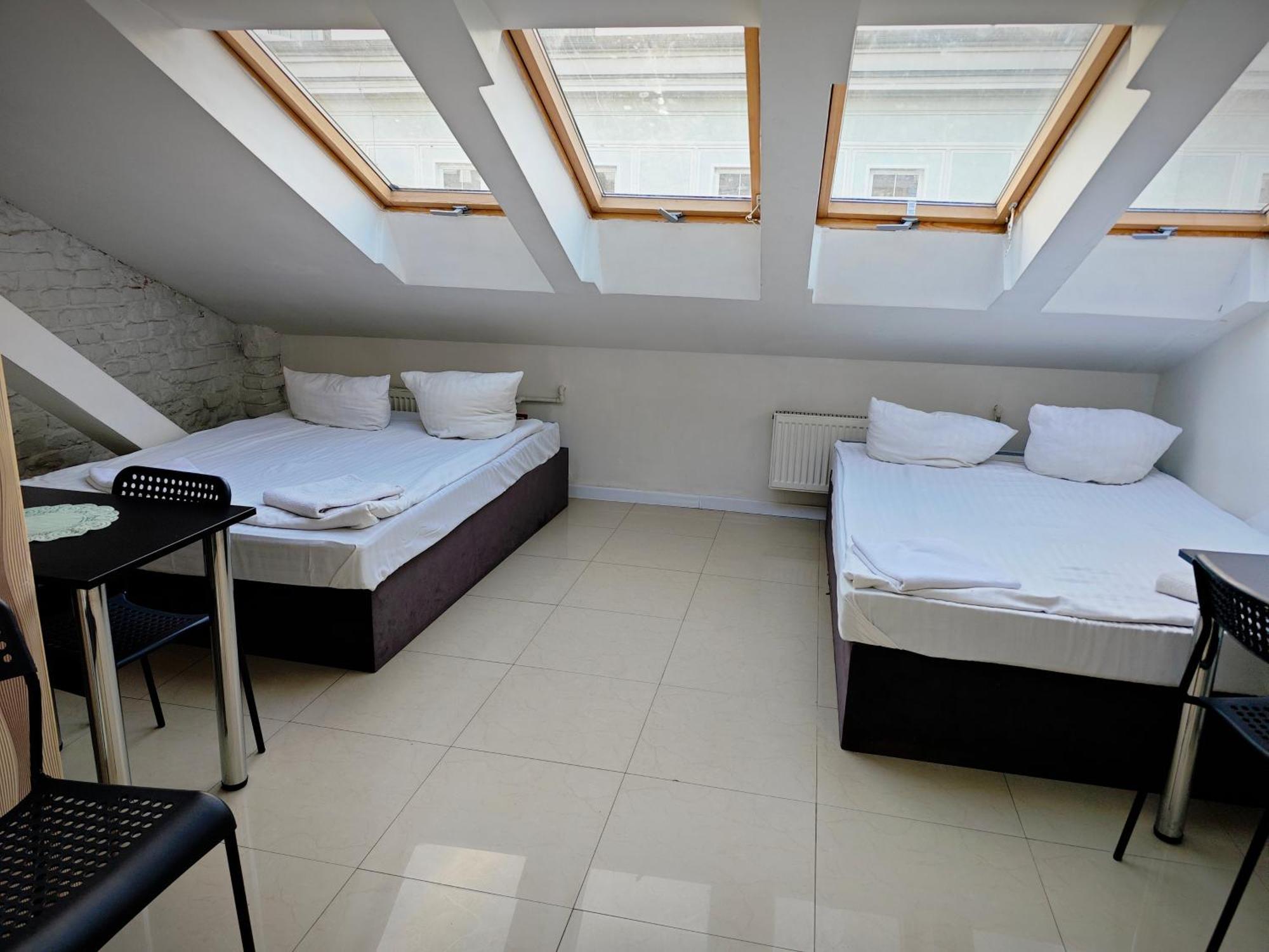 Apartamenty Hoza Attic Studio วอร์ซอ ห้อง รูปภาพ