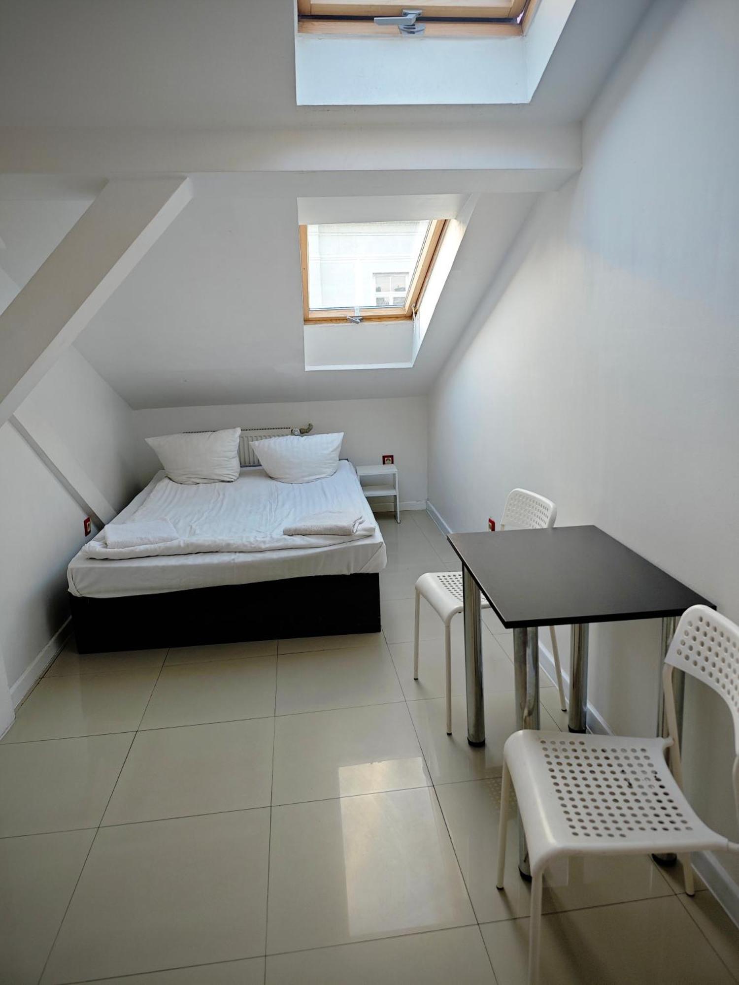 Apartamenty Hoza Attic Studio วอร์ซอ ห้อง รูปภาพ